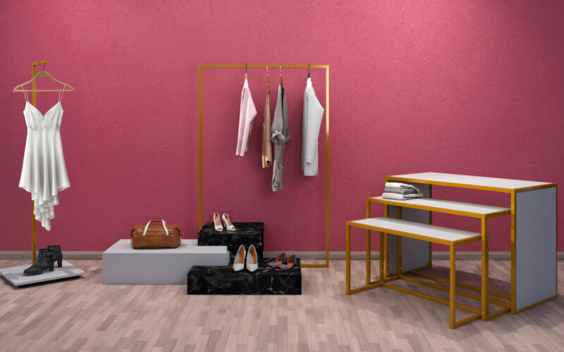 arredo negozi abbigliamento minimale con pedane centrali tavoli servizio espositivi appenderia frontale oro bronzo marmo nero grigio 01